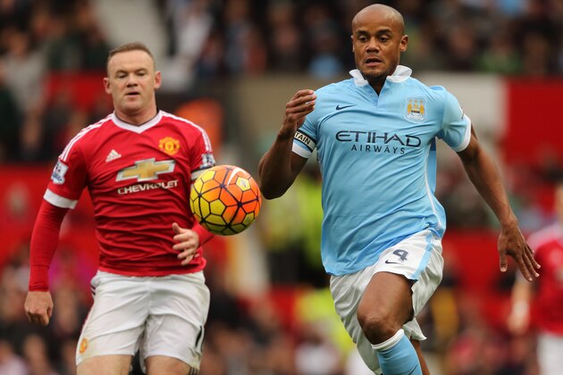 MANCHESTER, ENGLAND - OCTOBER 25:  Wayne Rooney of Manchester United and Vincent Kompany of Manchester City during the Barclays Premier League match between Manchester United and Manchester City at Old Trafford on October 25, 2015 in Manchester, England.  (Photo by Matthew Ashton - AMA/Getty Images)