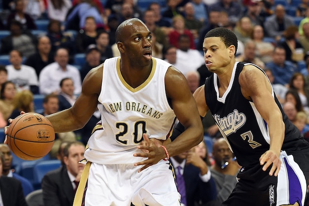 NEW ORLEANS, LA - MARCH 27:  Quincy Pondexter #20 of the New Orleans Pelicans is defended by Ray McCallum #3 of the Sacramento Kings during a game at the Smoothie King Center on March 27, 2015 in New Orleans, Louisiana.  NOTE TO USER: User expressly acknowledges and agrees that, by downloading and or using this photograph, User is consenting to the terms and conditions of the Getty Images License Agreement.  (Photo by Stacy Revere/Getty Images)