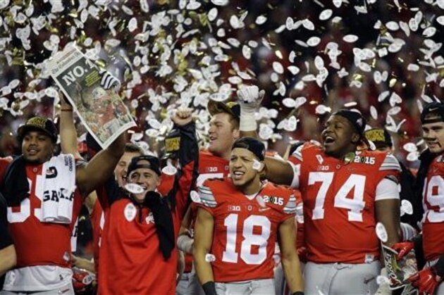 Ohio State players celebrate after the NCAA college football playoff championship game against Oregon Monday, Jan. 12, 2015, in Arlington, Texas. Ohio State won 42-20. (AP Photo/Eric Gay)