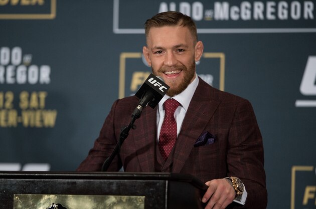 LAS VEGAS, NV - DECEMBER 12: UFC featherweight champion Conor McGregor speaks to the media at the post fight press conference after his 13 second knockout victory over Jose Aldo in their featherweight championship fight during the UFC 194 event inside MGM Grand Garden Arena on December 12, 2015 in Las Vegas, Nevada. (Photo by Brandon Magnus/Zuffa LLC/Zuffa LLC via Getty Images) LAS VEGAS, NV - DECEMBER 12: UFC featherweight champion Conor McGregor speaks to the media at the post fight press conference after his 13 second knockout victory over Jose Aldo in their featherweight championship fight during the UFC 194 event inside MGM Grand Garden Arena on December 12, 2015 in Las Vegas, Nevada. (Photo by Brandon Magnus/Zuffa LLC/Zuffa LLC via Getty Images)