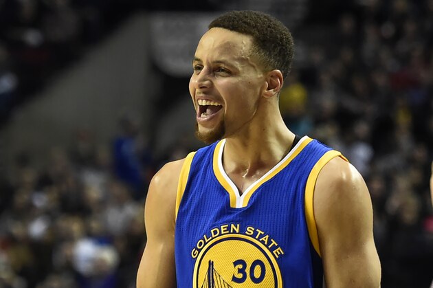 Golden State Warriors guard Stephen Curry celebrates after teammate Klay Thompson hit a 3-point shot during the first half of an NBA basketball game against the Portland Trail Blazers in Portland, Ore., Friday, Jan. 8, 2016. (AP Photo/Steve Dykes)