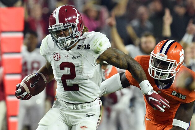 Jan 11, 2016; Glendale, AZ, USA; Alabama Crimson Tide running back Derrick Henry (2) breaks away from Clemson Tigers safety Jayron Kearse (1) to score a touchdown in the first quarter in the 2016 CFP National Championship at University of Phoenix Stadium. Mandatory Credit: Matt Kartozian-USA TODAY Sports
