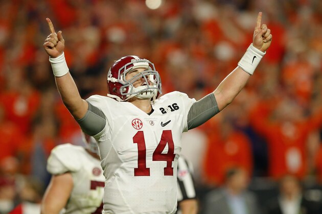 GLENDALE, AZ - JANUARY 11:  Jake Coker #14 of the Alabama Crimson Tide celebrates after Derrick Henry #2 scored a one yard touchdown in the fourth quarter against the Clemson Tigers during the 2016 College Football Playoff National Championship Game at University of Phoenix Stadium on January 11, 2016 in Glendale, Arizona.  (Photo by Kevin C. Cox/Getty Images)