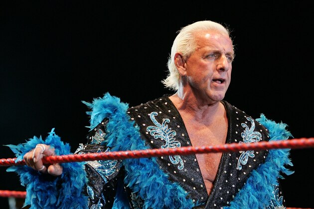 PERTH, AUSTRALIA - NOVEMBER 24:  Ric Flair looks on while awaiting the entrance of Hulk Hogan during the Hulkamania Tour at the Burswood Dome on November 24, 2009 in Perth, Australia.  (Photo by Paul Kane/Getty Images)