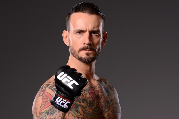 DALLAS, TX - MARCH 13: Phil 'CM Punk' Brooks poses for a photo during a UFC photo session at the Hilton Anatole Hotel on March 13, 2015 in Dallas, Texas. (Photo by Mike Roach/Zuffa LLC/Zuffa LLC via Getty Images) DALLAS, TX - MARCH 13: Phil 'CM Punk' Brooks poses for a photo during a UFC photo session at the Hilton Anatole Hotel on March 13, 2015 in Dallas, Texas. (Photo by Mike Roach/Zuffa LLC/Zuffa LLC via Getty Images)