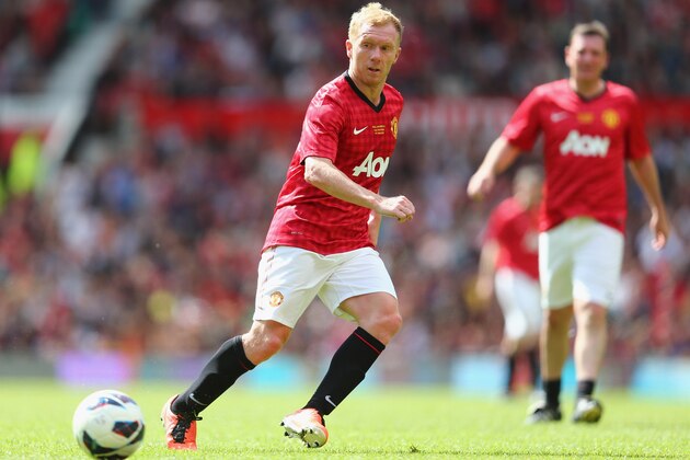 MANCHESTER, ENGLAND - JUNE 02:  Paul Scholes of Manchester United in action during the charity match between Manchester United Legends and Real Madrid Legends at Old Trafford on June 2, 2013 in Manchester, England.  (Photo by Clive Mason/Getty Images)