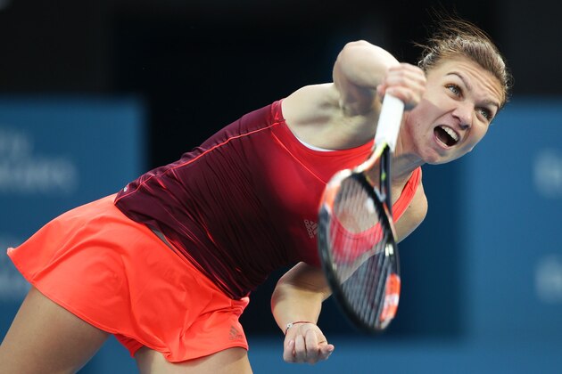 SYDNEY, AUSTRALIA - JANUARY 12:  Simona Halep of Romania serves in her match against Caroline Garcia of France during day three of the 2016 Sydney International at Sydney Olympic Park Tennis Centre on January 12, 2016 in Sydney, Australia.  (Photo by Matt King/Getty Images)