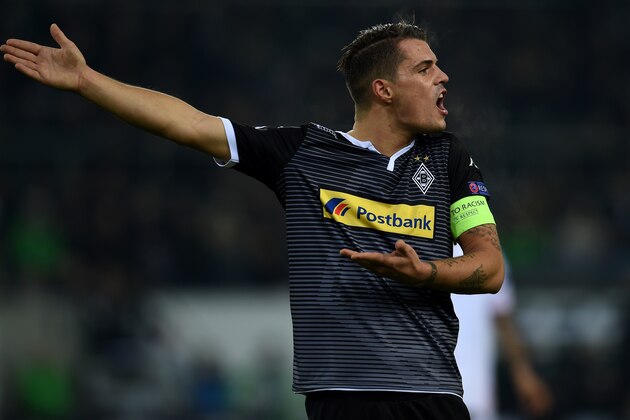 Moenchengladbach's Swiss midfielder Granit Xhaka reacts during the Group D, second-leg UEFA Champions League football match Borussia Moenchengladbach vs FC Sevilla in Moenchengladbach, western Germany on November 25, 2015. AFP PHOTO / PATRIK STOLLARZ / AFP / PATRIK STOLLARZ        (Photo credit should read PATRIK STOLLARZ/AFP/Getty Images)