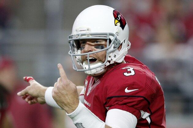 Arizona Cardinals quarterback Carson Palmer (3) calls a play against the Seattle Seahawks during the first half of an NFL football game, Sunday, Jan. 3, 2016, in Glendale, Ariz. (AP Photo/Ross D. Franklin)