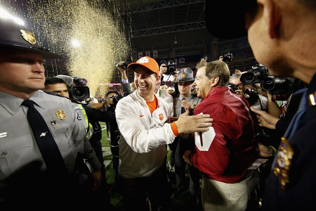 GLENDALE, AZ - JANUARY 11:  Head coach Nick Saban of the Alabama Crimson Tide shakes hands with head coach Dabo Swinney of the Clemson Tigers after the 2016 College Football Playoff National Championship Game at University of Phoenix Stadium on January 11, 2016 in Glendale, Arizona.  The Crimson Tide defeated the Tigers with a score of 45 to 40.  (Photo by Christian Petersen/Getty Images)