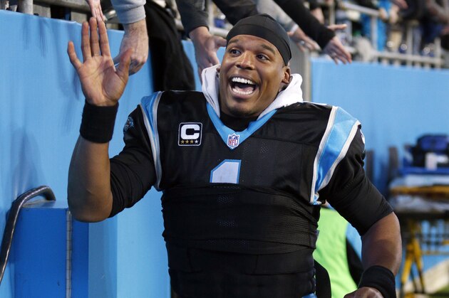 Carolina Panthers' Cam Newton (1) celebrates his team's 15-1 regular season record following an NFL football game against the Tampa Bay Buccaneers in Charlotte, N.C., Sunday, Jan. 3, 2016. The Panthers won 38-10. (AP Photo/Bob Leverone)