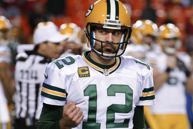 Green Bay Packers quarterback Aaron Rodgers pumps his fist as he walks off the field in the closing minutes of the team's NFL wild-card playoff football game against the Washington Redskins in Landover, Md., Sunday, Jan. 10, 2016. The Packers won 35-18. (AP Photo/Alex Brandon)