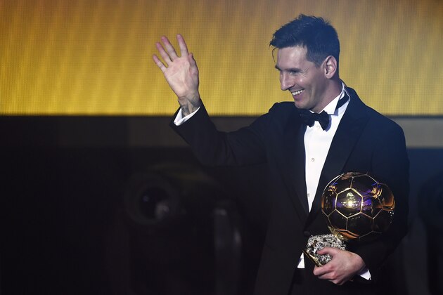 FC Barcelona and Argentina's forward  Lionel Messi waves holding his trophy after receiving the 2015 FIFA Ballon dOr award for player of the year during the 2015 FIFA Ballon d'Or award ceremony at the Kongresshaus in Zurich on January 11, 2016. AFP PHOTO / OLIVIER MORIN / AFP / OLIVIER MORIN        (Photo credit should read OLIVIER MORIN/AFP/Getty Images)