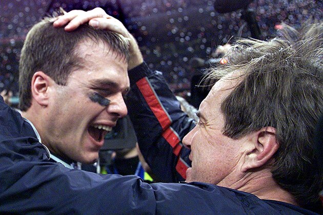 NEW ORLEANS, UNITED STATES:  New England Patriots' quarterback Tom Brady celebrates with head coach Bill Belichick (R) after their win over the St. Louis Rams 03 February, 2002 in Super Bowl XXXVI in New Orleans, Louisiana. The Patriots defeated the Rams 20-17 for the NFL championship. AFP PHOTO/Jeff HAYNES (Photo credit should read JEFF HAYNES/AFP/Getty Images)