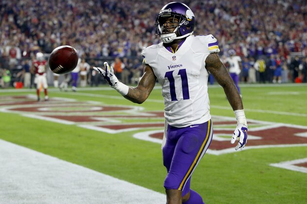 Minnesota Vikings wide receiver Mike Wallace (11) tosses the ball to the official after a touchdown catch against the Arizona Cardinals during the second half of an NFL football game, Thursday, Dec. 10, 2015, in Glendale, Ariz. (AP Photo/Rick Scuteri) Minnesota Vikings wide receiver Mike Wallace (11) tosses the ball to the official after a touchdown catch against the Arizona Cardinals during the second half of an NFL football game, Thursday, Dec. 10, 2015, in Glendale, Ariz. (AP Photo/Rick Scuteri)