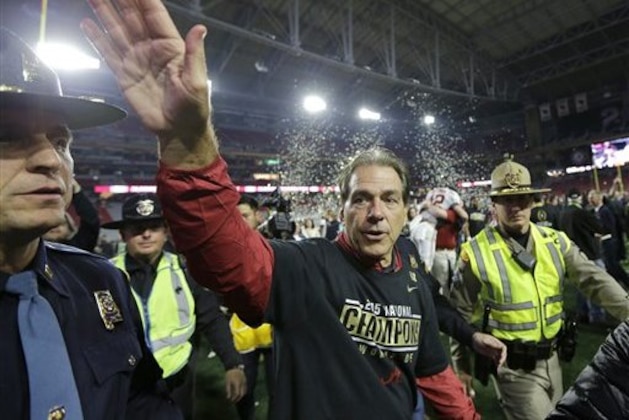 Alabama head coach Nick Saban waves to fans after the NCAA college football playoff championship game against Clemson Monday, Jan. 11, 2016, in Glendale, Ariz. Alabama won 45-40. (AP Photo/David J. Phillip)