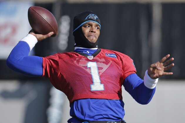 Carolina Panthers' Cam Newton throws a pass during practice for the NFL football team in Charlotte, N.C., Thursday, Jan. 7, 2016. (AP Photo/Chuck Burton)