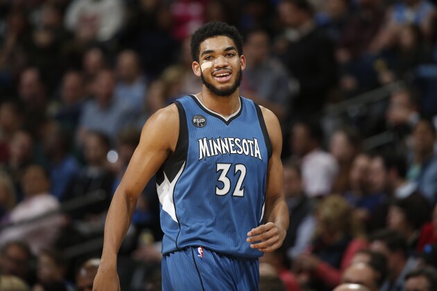 Minnesota Timberwolves center Karl-Anthony Towns (32) in the first half of an NBA basketball game Friday, Dec.11, 2015, in Denver. (AP Photo/David Zalubowski)