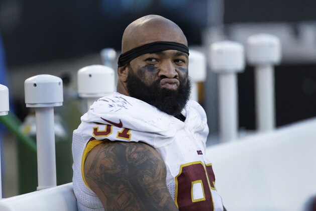 Washington Redskins' Jason Hatcher (97) sits on the bench late in the second half of an NFL football game against the Carolina Panthers in Charlotte, N.C., Sunday, Nov. 22, 2015. The Panthers won 44-16. (AP Photo/Bob Leverone)
