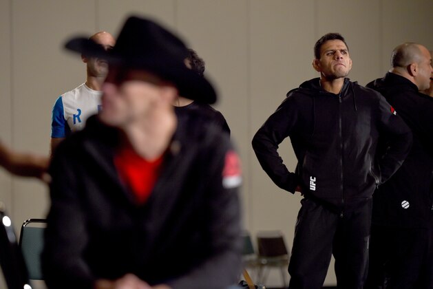 ORLANDO, FL - DECEMBER 18:  Rafael dos Anjos of Brazil (R) waits backstage during the UFC weigh-in inside the Orange County Convention Center on December 18, 2015 in Orlando, Florida.  (Photo by Jeff Bottari/Zuffa LLC/Zuffa LLC via Getty Images)