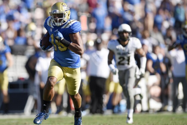 Oct 31, 2015; Pasadena, CA, USA; UCLA Bruins wide receiver Thomas Duarte (front) runs the ball down the field during the fourth quarter against the Colorado Buffaloes at Rose Bowl. The UCLA Bruins won 35-31. Mandatory Credit: Kelvin Kuo-USA TODAY Sports Oct 31, 2015; Pasadena, CA, USA; UCLA Bruins wide receiver Thomas Duarte (front) runs the ball down the field during the fourth quarter against the Colorado Buffaloes at Rose Bowl. The UCLA Bruins won 35-31. Mandatory Credit: Kelvin Kuo-USA TODAY Sports