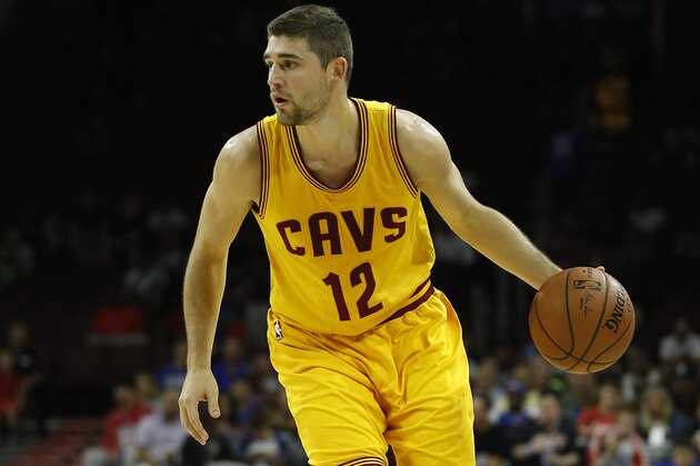 Cleveland Cavaliers' Joe Harris in action during an NBA preseason basketball game against the Philadelphia 76ers, Thursday, Oct. 8, 2015, in Philadelphia. (AP Photo/Matt Slocum)