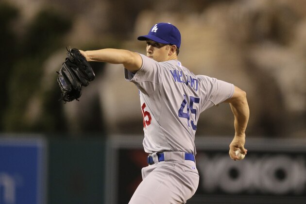Los Angeles Dodgers starting pitcher Joe Wieland throws against the Los Angeles Angels during the first inning of a baseball game, Wednesday, Sept. 9, 2015, in Anaheim, Calif. (AP Photo/Jae C. Hong)