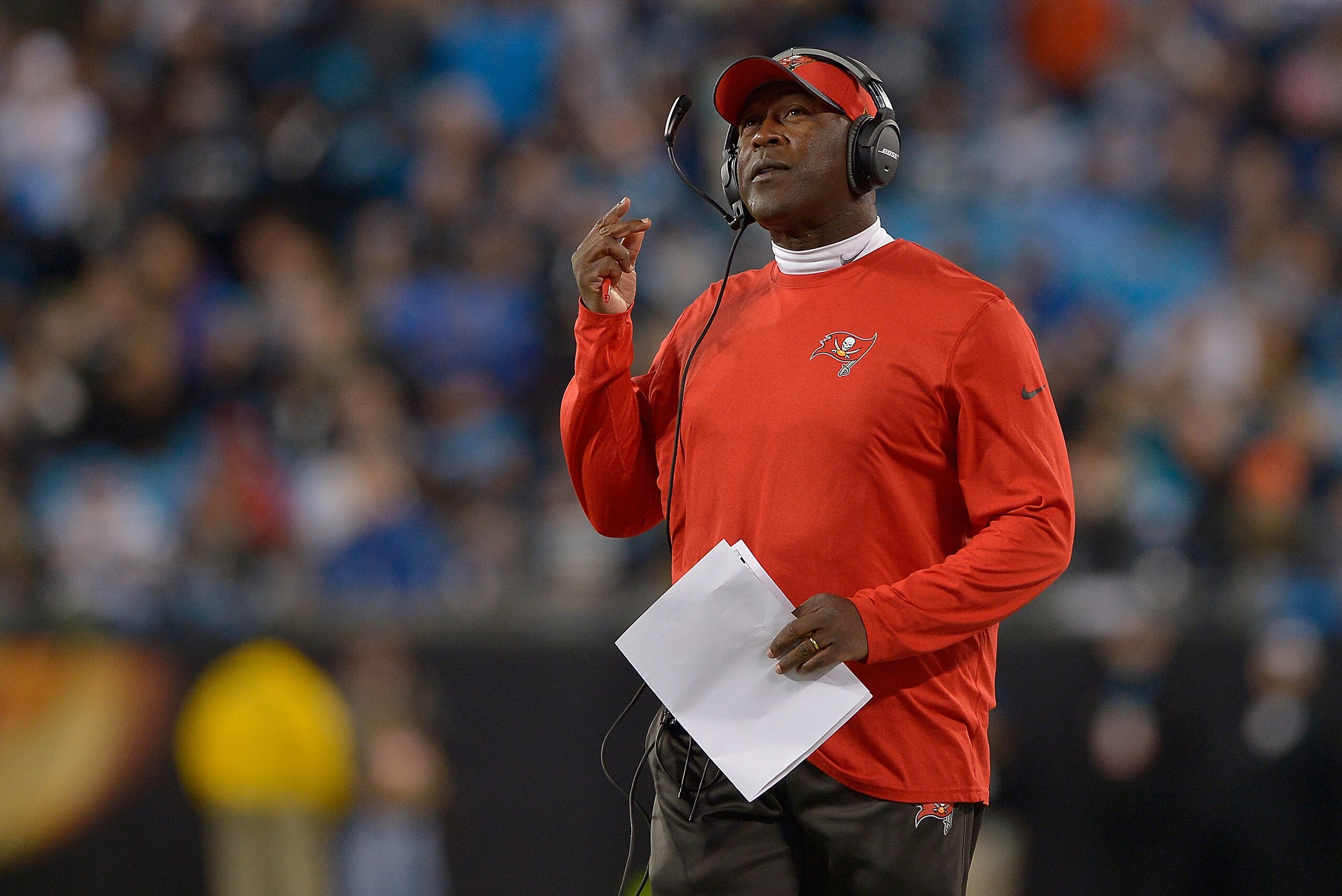 CHARLOTTE, NC - JANUARY 03:  Head coach Lovie Smith of the Tampa Bay Buccaneers watches his team during their game against the Carolina Panthers at Bank of America Stadium on January 3, 2016 in Charlotte, North Carolina.  (Photo by Grant Halverson/Getty Images)