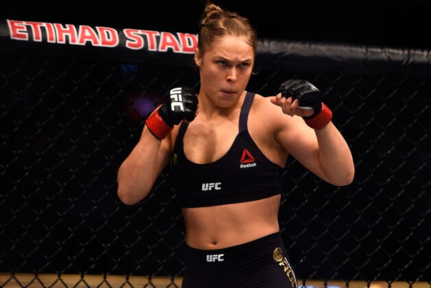 MELBOURNE, AUSTRALIA - NOVEMBER 15:  Ronda Rousey waits in her corner before facing Holly Holm in their women's bantamweight championship bout during the UFC 193 event at Etihad Stadium on November 15, 2015 in Melbourne, Australia. (Photo by Jeff Bottari/Zuffa LLC/Zuffa LLC via Getty Images)