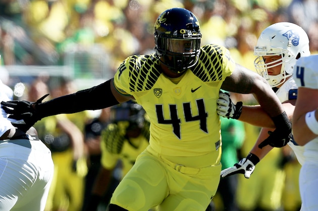 Oregon defensive lineman DeForest Buckner (44) breaks through the Georgia State offensive line during the first quarter of an NCAA college football game, Saturday, Sept. 19, 2015, in Eugene, Ore. (AP Photo/Ryan Kang)