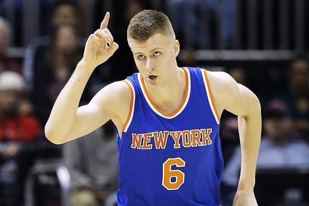 New York Knicks' Kristaps Porzingis, of Latvia, gestures after scoring in the first quarter of an NBA basketball game against the Atlanta Hawks Saturday, Dec. 26, 2015, in Atlanta. (AP Photo/David Goldman)