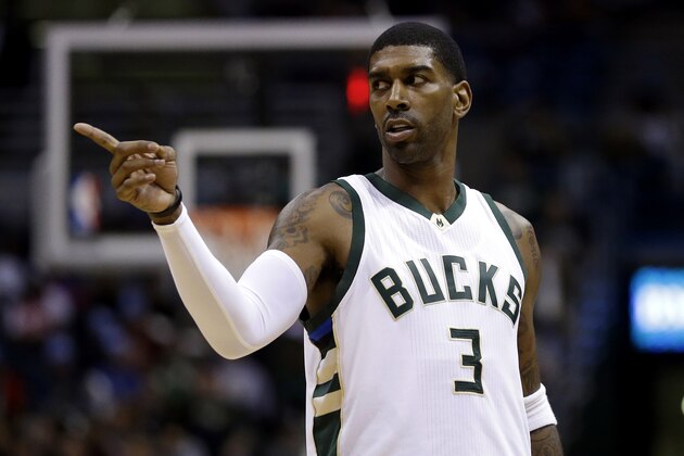 Milwaukee Bucks' O.J. Mayo gestures to a teammate during an NBA basketball game against the Philadelphia 76ers Wednesday, Dec. 23, 2015, in Milwaukee. (AP Photo/Aaron Gash)