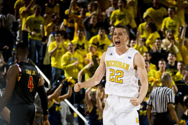 Michigan guard Duncan Robinson (22) celebrates after the final seconds of an NCAA college basketball game against Maryland at Crisler Center in Ann Arbor, Mich., Tuesday, Jan. 12, 2016. Michigan won 70-67. (AP Photo/Tony Ding)