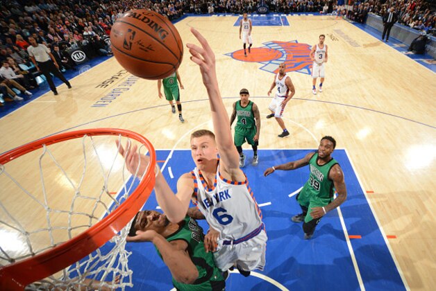 NEW YORK,NY - JANUARY 12: Kristaps Porzingis #6 of the New York Knicks goes up for the layup against the Boston Celtics at Madison Square Garden on January 12, 2016 in New York,New York NOTE TO USER: User expressly acknowledges and agrees that, by downloading and/or using this Photograph, user is consenting to the terms and conditions of the Getty Images License Agreement. Mandatory Copyright Notice: Copyright 2016 NBAE (Photo by Jesse D. Garrabrant/NBAE via Getty Images)