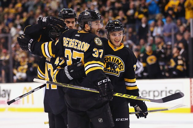 BOSTON, MA - NOVEMBER 27:  Patrice Bergeron #37 of the Boston Bruins celebrates with Frank Vatrano #72 and Torey Krug #47 after scoring a goal against the New York Rangers during the first period at TD Garden on November 27, 2015 in Boston, Massachusetts.  (Photo by Maddie Meyer/Getty Images)