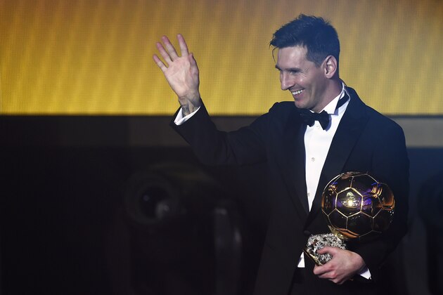 FC Barcelona and Argentina's forward  Lionel Messi waves holding his trophy after receiving the 2015 FIFA Ballon dOr award for player of the year during the 2015 FIFA Ballon d'Or award ceremony at the Kongresshaus in Zurich on January 11, 2016. AFP PHOTO / OLIVIER MORIN / AFP / OLIVIER MORIN        (Photo credit should read OLIVIER MORIN/AFP/Getty Images)