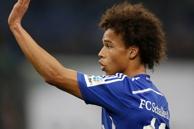 Schalke's midfielder Leroy Sane waves during the German first division Bundesliga football match FC Schalke 04 vs FC Ingolstadt 04 in Gelsenkirchen, western Germany, on October 31, 2015.    

 / AFP / NORBERT SCHMIDT        (Photo credit should read NORBERT SCHMIDT/AFP/Getty Images)