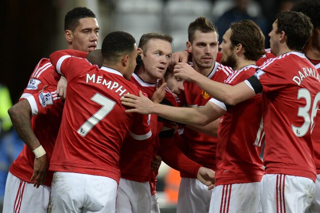 Manchester United's English striker Wayne Rooney (3rd L) celebrates with teammates after scoring their third goal during the English Premier League football match between Newcastle United and Manchester United at St James' Park in Newcastle-upon-Tyne, north east England on January 12, 2016.  AFP PHOTO / OLI SCARFF

RESTRICTED TO EDITORIAL USE. NO USE WITH UNAUTHORIZED AUDIO, VIDEO, DATA, FIXTURE LISTS, CLUB/LEAGUE LOGOS OR 'LIVE' SERVICES. ONLINE IN-MATCH USE LIMITED TO 75 IMAGES, NO VIDEO EMULATION. NO USE IN BETTING, GAMES OR SINGLE CLUB/LEAGUE/PLAYER PUBLICATIONS. / AFP / OLI SCARFF        (Photo credit should read OLI SCARFF/AFP/Getty Images)