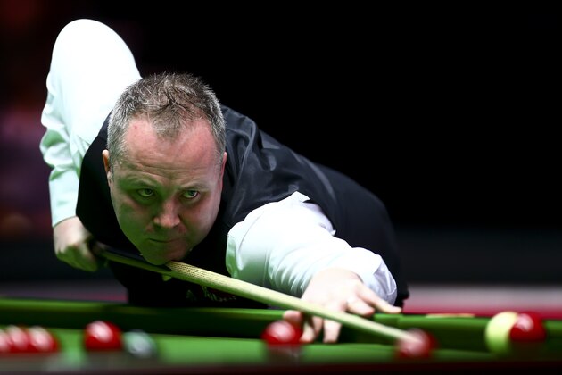 LONDON, ENGLAND - JANUARY 13:  John Higgins of Scotland plays a shot in his first round match against Liang Wenbo of China during Day Four of the Dafabet Masters at Alexandra Palace on January 13, 2016 in London, England.  (Photo by Jordan Mansfield/Getty Images)