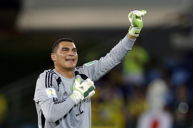 Colombia's goalkeeper Faryd Mondragon, waves to spectators after the group C World Cup soccer match between Japan and Colombia at the Arena Pantanal in Cuiaba, Brazil, Tuesday, June 24, 2014. Colombia won the match 4-1. (AP Photo/Kirsty Wigglesworth)