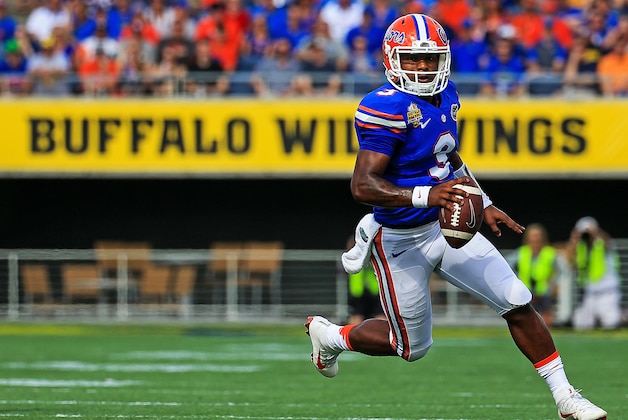 ORLANDO, FL - JANUARY 01: Treon Harris #3 of the Florida Gators carries during the first half of the Buffalo Wild Wings Citrus Bowl game against the Michigan Wolverines at Orlando Citrus Bowl on January 1, 2016 in Orlando, Florida.  (Photo by Rob Foldy/Getty Images)