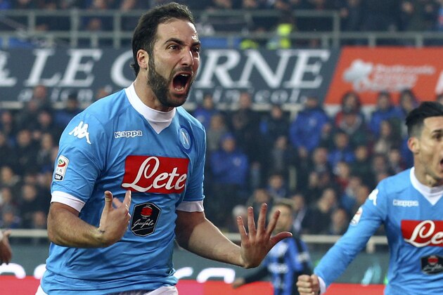 Napoli's Gonzalo Higuain celebrates after scoring during a Serie A soccer match against Atalanta in Bergamo, Italy, Sunday, Dec. 20, 2015. (Paolo Magni/ANSA via AP)