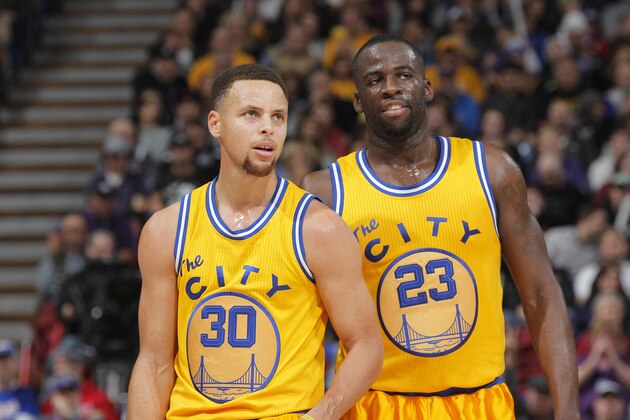 SACRAMENTO, CA - JANUARY 9: Stephen Curry #30 and Draymond Green #23 of the Golden State Warriors face the Sacramento Kings on January 9, 2016 at Sleep Train Arena in Sacramento, California. NOTE TO USER: User expressly acknowledges and agrees that, by downloading and or using this photograph, User is consenting to the terms and conditions of the Getty Images Agreement. Mandatory Copyright Notice: Copyright 2016 NBAE (Photo by Rocky Widner/NBAE via Getty Images)