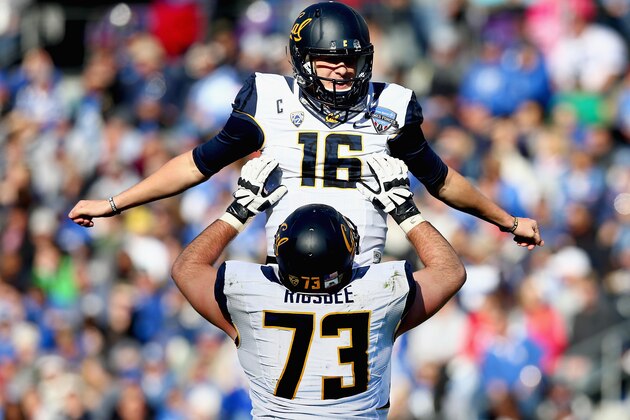 FORT WORTH, TX - DECEMBER 29:  Jared Goff #16 of the California Golden Bears celebrates with Jordan Rigsbee #73 of the California Golden Bears after throwing a touchdown pass against the Air Force Falcons in the second quarter of the Lockheed Martin Armed Forces Bowl at Amon G. Carter Stadium on December 29, 2015 in Fort Worth, Texas.  (Photo by Tom Pennington/Getty Images)