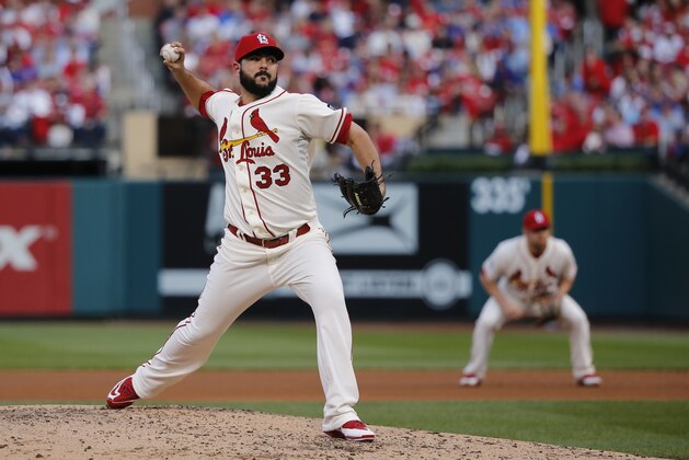 St. Louis Cardinals' Carlos Villanueva (33) throws during the fourth inning of Game 2 in baseball's National League Division Series against the Chicago Cubs, Saturday, Oct. 10, 2015, in St. Louis. (AP Photo/Charles Rex Arbogast)