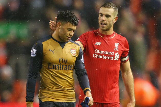 LIVERPOOL, ENGLAND - JANUARY 13: Alex Oxlade-Chamberlain of Arsenal and Jordan Henderson of Liverpool applaud after their 3-3 draw in the Barclays Premier League match between Liverpool and Arsenal at Anfield on January 13, 2016 in Liverpool, England.  (Photo by Alex Livesey/Getty Images)