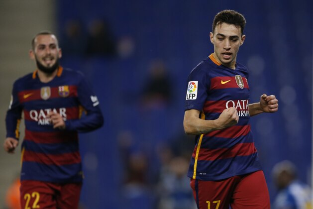 FC Barcelona's Munir El Haddadi celebrates after scoring against Espanyol during a Copa del Rey soccer match at RCDE stadium in Barcelona, Spain, Wednesday, Jan. 13, 2016. (AP Photo/Manu Fernandez)