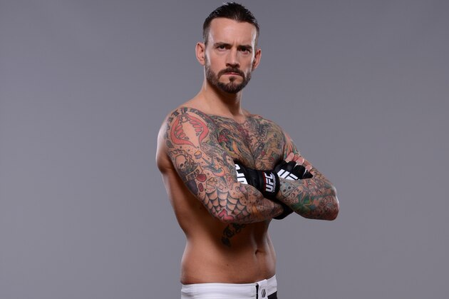 DALLAS, TX - MARCH 13: Phil 'CM Punk' Brooks poses for a photo during a UFC photo session at the Hilton Anatole Hotel on March 13, 2015 in Dallas, Texas. (Photo by Mike Roach/Zuffa LLC/Zuffa LLC via Getty Images) DALLAS, TX - MARCH 13: Phil 'CM Punk' Brooks poses for a photo during a UFC photo session at the Hilton Anatole Hotel on March 13, 2015 in Dallas, Texas. (Photo by Mike Roach/Zuffa LLC/Zuffa LLC via Getty Images)