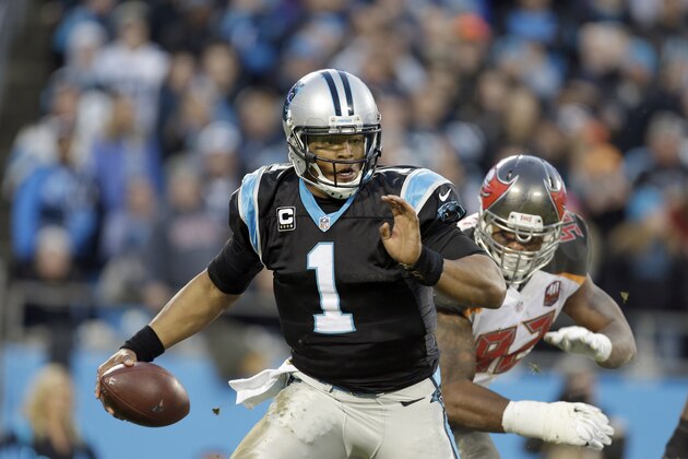 Carolina Panthers' Cam Newton (1) scrambles away from the Tampa Bay Buccaneers' defense during the first half of an NFL football game in Charlotte, N.C., Sunday, Jan. 3, 2016. The Panthers won 38-10. (AP Photo/Bob Leverone)
