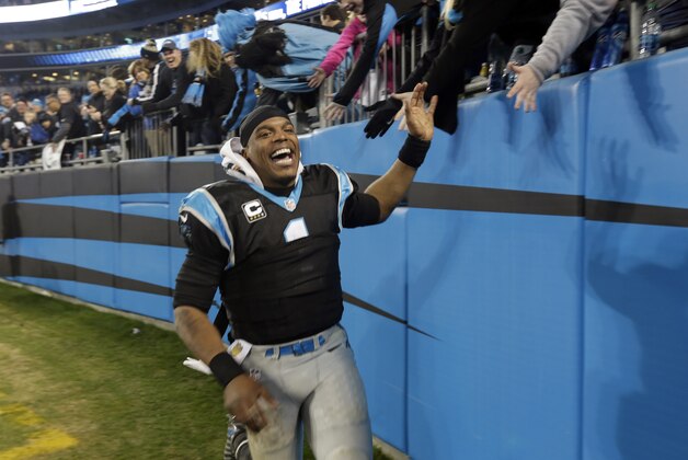 Carolina Panthers' Cam Newton (1) celebrates his team's 15-1 regular season record following an NFL football game against the Tampa Bay Buccaneers in Charlotte, N.C., Sunday, Jan. 3, 2016. The Panthers won 38-10. (AP Photo/Bob Leverone)